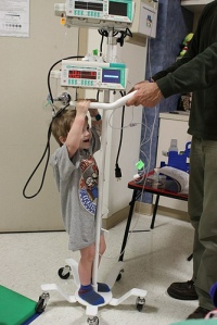 "He got his first of many rides on his IV pole."